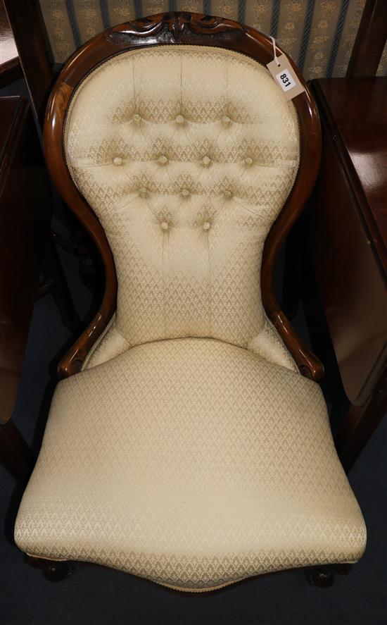 A Victorian mahogany nursing chair